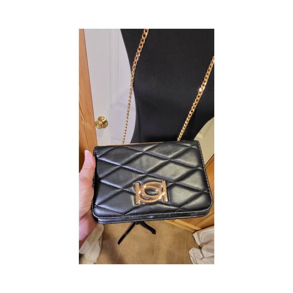 BeBe Crossbody purse, black, long gold color strap, divided sections. - Picture 2 of 13